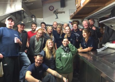 group photo of Moby Dick's restaurant staff in the kitchen